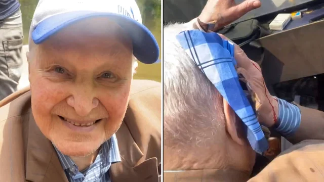 Kherson, l'uomo viene portato in salvo dopo l'inondazione ma l'imbarcazione finisce tra i bombardamenti