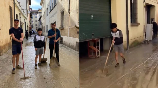 Il Pilota Formula 1 Tsunoda aiuta a spalare il fango a Faenza