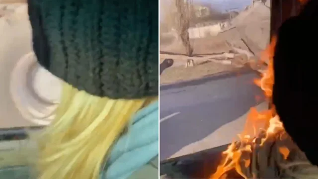 Ucraina: ragazza lancia una molotov contro un carro armato russo
