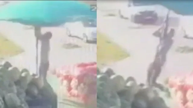 Turchia, un commerciante prova a chiudere l'ombrellone ma finisce male: il video