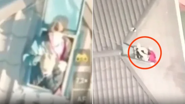 Donna e bambini chiedono aiuto: i soldati ucraini consegnano una bottiglia d'acqua col drone