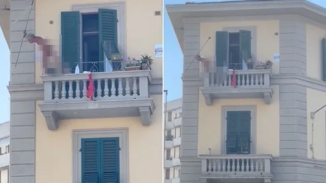 Firenze, uomo nudo minaccia i passanti dal balcone: il video