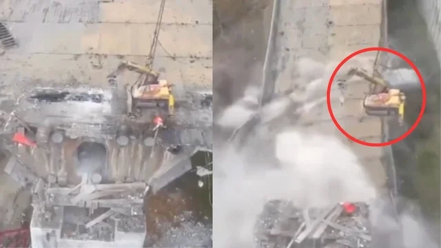 Il ponte crolla e la gru rimane appesa in aria: l'incredibile video